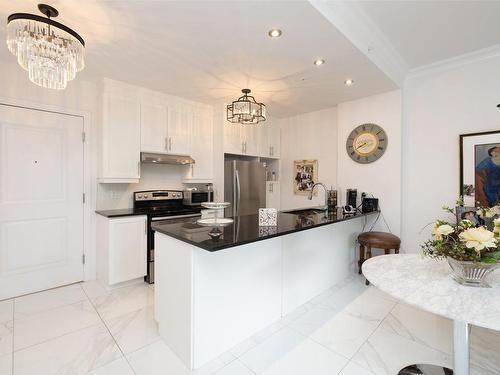 Kitchen - 107-16 Rue Roger-Pilon, Dollard-Des-Ormeaux, QC - Indoor Photo Showing Kitchen