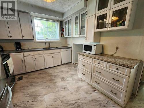 21 Beavis Ter, Temiskaming Shores, ON - Indoor Photo Showing Kitchen With Double Sink
