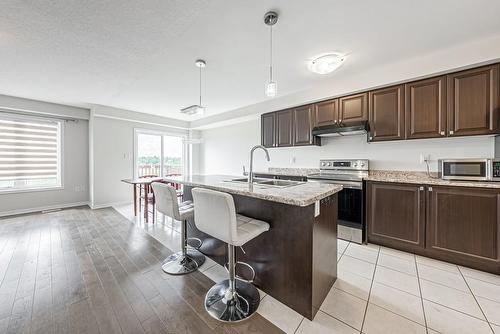 403 Pumpkin Pass, Binbrook, ON - Indoor Photo Showing Kitchen With Double Sink