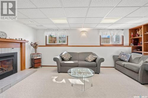 726 Wilkinson Way, Saskatoon, SK - Indoor Photo Showing Living Room With Fireplace