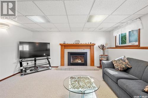726 Wilkinson Way, Saskatoon, SK - Indoor Photo Showing Living Room With Fireplace