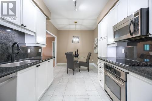201 - 65 Port Street E, Mississauga, ON - Indoor Photo Showing Kitchen With Double Sink With Upgraded Kitchen
