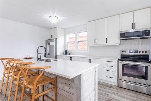 107 Ivon Avenue, Hamilton, ON - Indoor Photo Showing Kitchen With Double Sink With Upgraded Kitchen