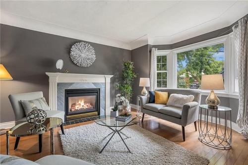 126 Queensdale Avenue, Hamilton, ON - Indoor Photo Showing Living Room With Fireplace