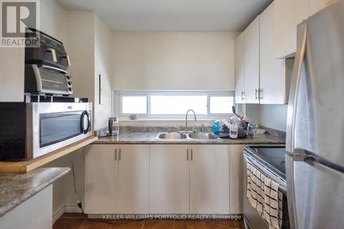 707 - 4673 Jane Street, Toronto, ON - Indoor Photo Showing Kitchen With Double Sink