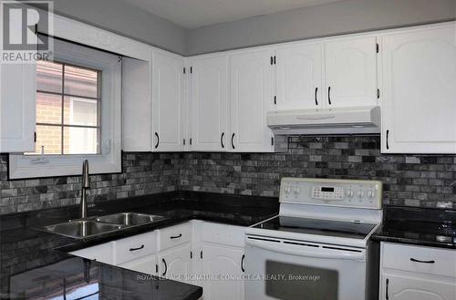 Main - 7 Romanway Crescent, Toronto, ON - Indoor Photo Showing Kitchen With Double Sink