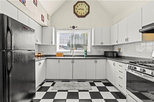 1234 Cannon Street E, Hamilton, ON - Indoor Photo Showing Kitchen With Double Sink