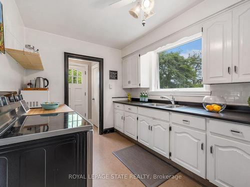 126 Queensdale Ave E, Hamilton, ON - Indoor Photo Showing Kitchen With Double Sink