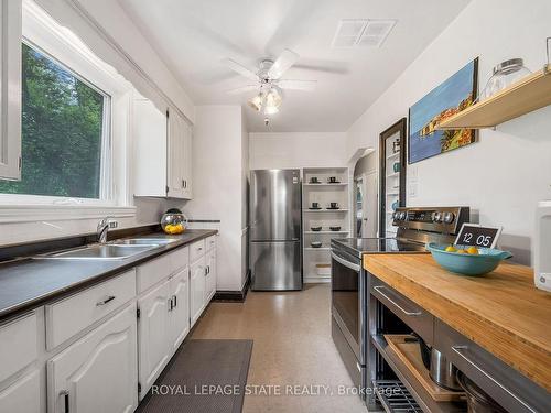 126 Queensdale Ave E, Hamilton, ON - Indoor Photo Showing Kitchen With Double Sink