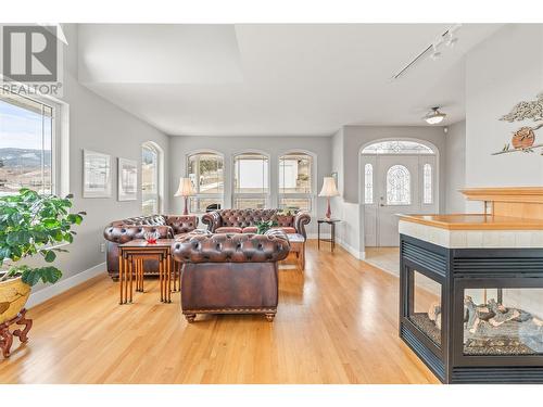 14225 Oyama Road, Lake Country, BC - Indoor Photo Showing Living Room With Fireplace