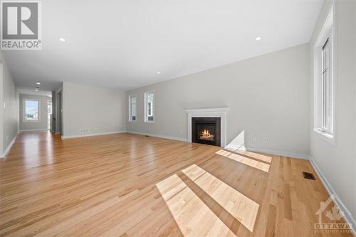 Great Room - 91 Hackamore Crescent, Richmond, ON - Indoor Photo Showing Living Room With Fireplace