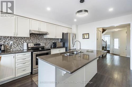 1732 Copeland Circle, Milton, ON - Indoor Photo Showing Kitchen With Double Sink With Upgraded Kitchen