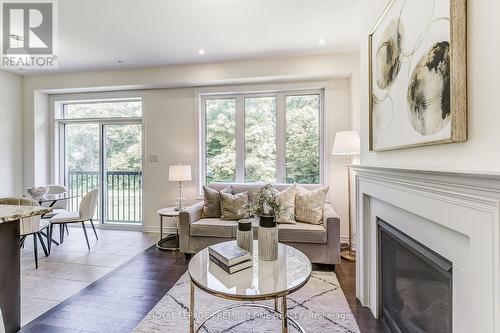 512 Black Cherry Crescent, Shelburne, ON - Indoor Photo Showing Living Room With Fireplace