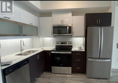 607 - 128 King Street N, Waterloo, ON - Indoor Photo Showing Kitchen With Double Sink With Upgraded Kitchen