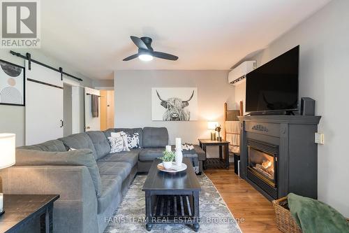 483 Mapleview Drive E, Innisfil, ON - Indoor Photo Showing Living Room With Fireplace