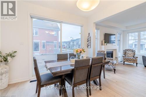 3 Milt Schmidt Street, Kitchener, ON - Indoor Photo Showing Dining Room With Fireplace