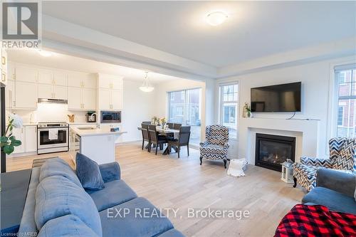 3 Milt Schmidt Street, Kitchener, ON - Indoor Photo Showing Living Room With Fireplace