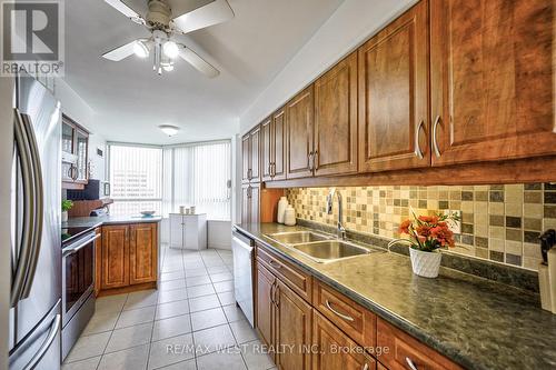 1504 - 3605 Kariya Drive, Mississauga, ON - Indoor Photo Showing Kitchen With Double Sink