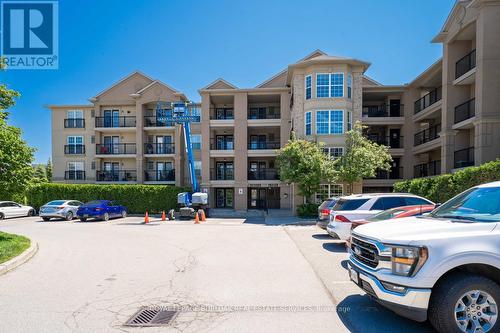 211 - 2045 Appleby Line, Burlington, ON - Outdoor With Facade