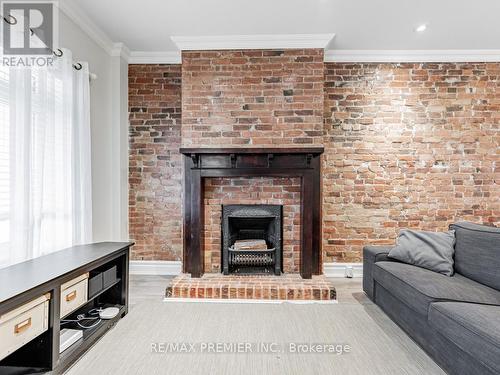 10 St Annes Road, Toronto, ON - Indoor Photo Showing Living Room With Fireplace