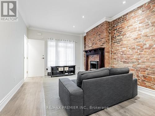 10 St Annes Road, Toronto (Little Portugal), ON - Indoor Photo Showing Living Room With Fireplace