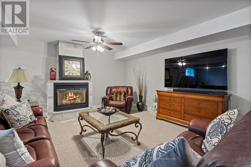 20 Hilltop Court, Kawartha Lakes, ON - Indoor Photo Showing Living Room With Fireplace