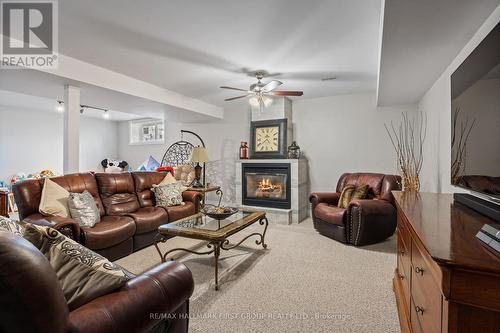 20 Hilltop Court, Kawartha Lakes, ON - Indoor Photo Showing Living Room With Fireplace