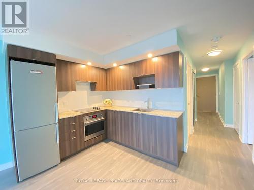 410 - 225 Village Green Square, Toronto, ON - Indoor Photo Showing Kitchen