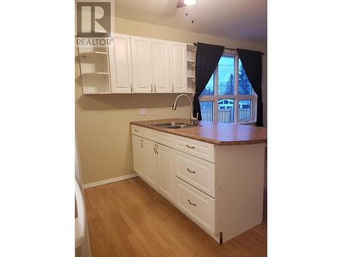 9507 96 Avenue, Fort St. John, BC - Indoor Photo Showing Kitchen With Double Sink