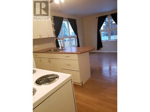 9507 96 Avenue, Fort St. John, BC - Indoor Photo Showing Kitchen With Double Sink