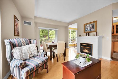 2000 Creekside Drive|Unit #305, Dundas, ON - Indoor Photo Showing Living Room With Fireplace