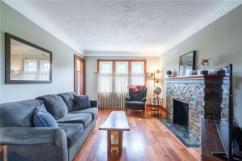 175 Brucedale Avenue E, Hamilton, ON - Indoor Photo Showing Living Room With Fireplace