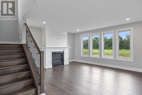 7355 Garnet, Mcgregor, ON - Indoor With Fireplace