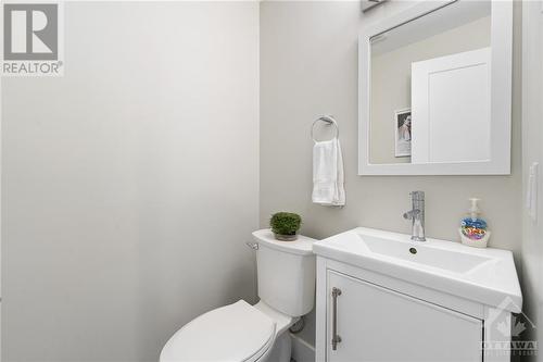 Powder Room next to Family Room - 2114 Balharrie Avenue, Ottawa, ON - Indoor Photo Showing Bathroom