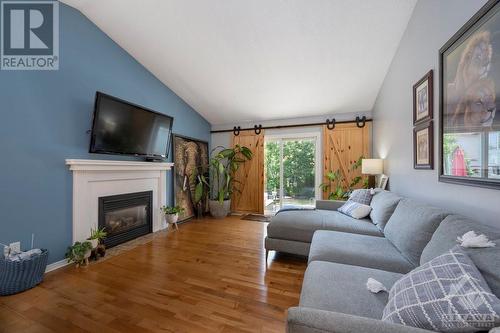 2176 Valin Street, Ottawa, ON - Indoor Photo Showing Living Room With Fireplace