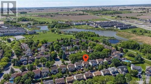 Direct access to waterside Meadowbreeze Park, walking trails, great schools & countless amenities. - 22 Fernbrook Place, Kanata, ON - Outdoor With View