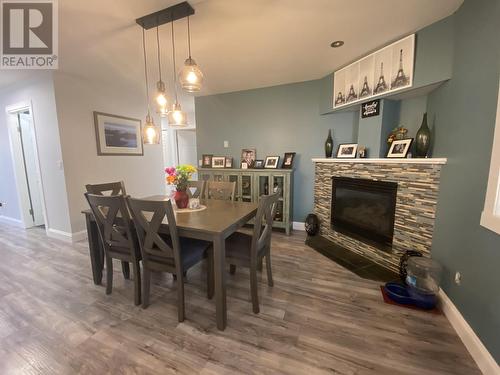 4932 Hundal Drive, Terrace, BC - Indoor Photo Showing Dining Room With Fireplace