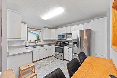 78 Bloomer Crescent, Winnipeg, MB - Indoor Photo Showing Kitchen With Double Sink