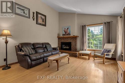 142 County 8 Road, Greater Napanee, ON - Indoor Photo Showing Living Room With Fireplace