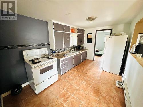 18 Georges Street, Rogersville, NB - Indoor Photo Showing Kitchen With Double Sink