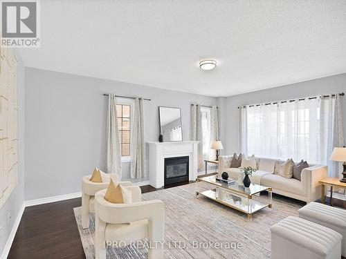 15 Oakhaven Road, Brampton, ON - Indoor Photo Showing Living Room With Fireplace