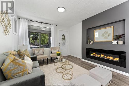 1453 Francois, Windsor, ON - Indoor Photo Showing Living Room With Fireplace