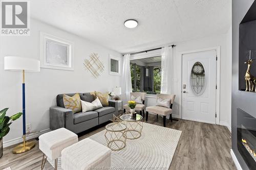 1453 Francois, Windsor, ON - Indoor Photo Showing Living Room With Fireplace