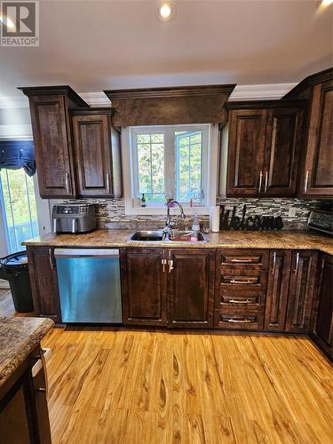 14-16 Carrolls Road, Spaniards Bay, NL - Indoor Photo Showing Kitchen With Double Sink