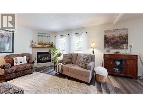 5151 Watson Lake Road, 100 Mile House, BC - Indoor Photo Showing Living Room With Fireplace