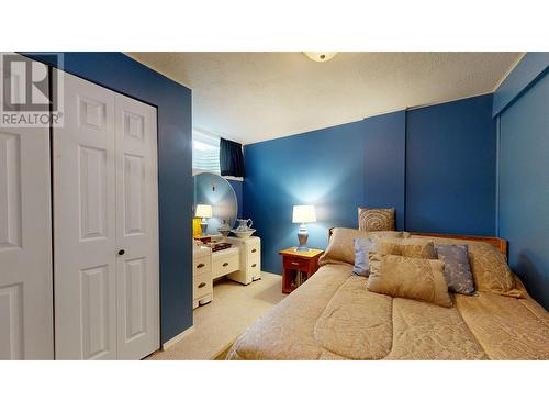 5151 Watson Lake Road, 100 Mile House, BC - Indoor Photo Showing Bedroom