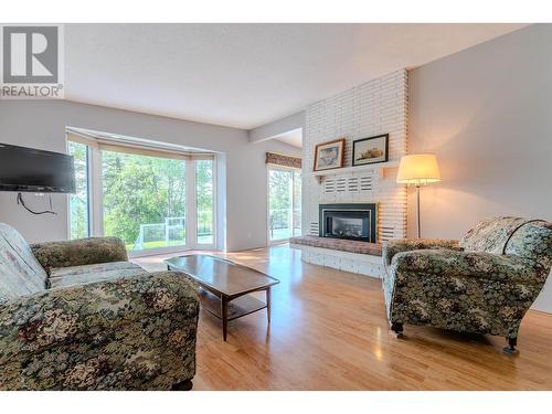 412 Williams Crescent, Prince George, BC - Indoor Photo Showing Living Room With Fireplace