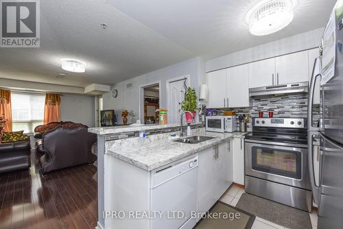 2111 - 6 Dayspring Circle, Brampton, ON - Indoor Photo Showing Kitchen With Double Sink