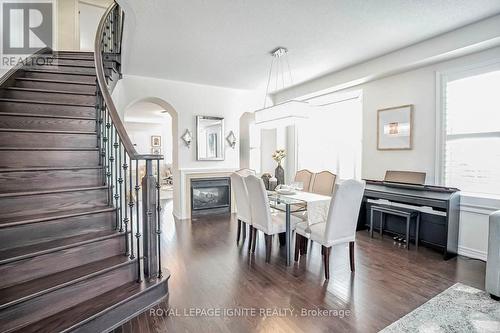 30 Russell Creek Drive, Brampton, ON - Indoor Photo Showing Dining Room With Fireplace