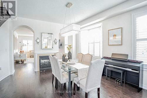 30 Russell Creek Drive, Brampton, ON - Indoor Photo Showing Dining Room With Fireplace